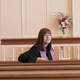 Rev. Sarah Taylor Peck preaches from empty pews at Community Christian Church